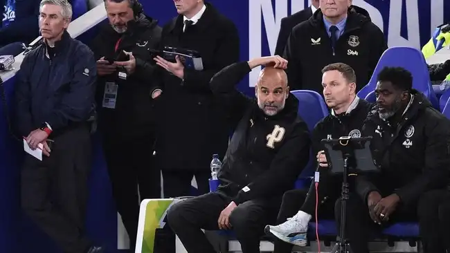 Pep Guardiola dan anak asuhnya